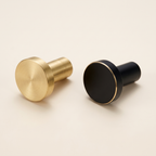 Brass and black round wall pegs, product photo