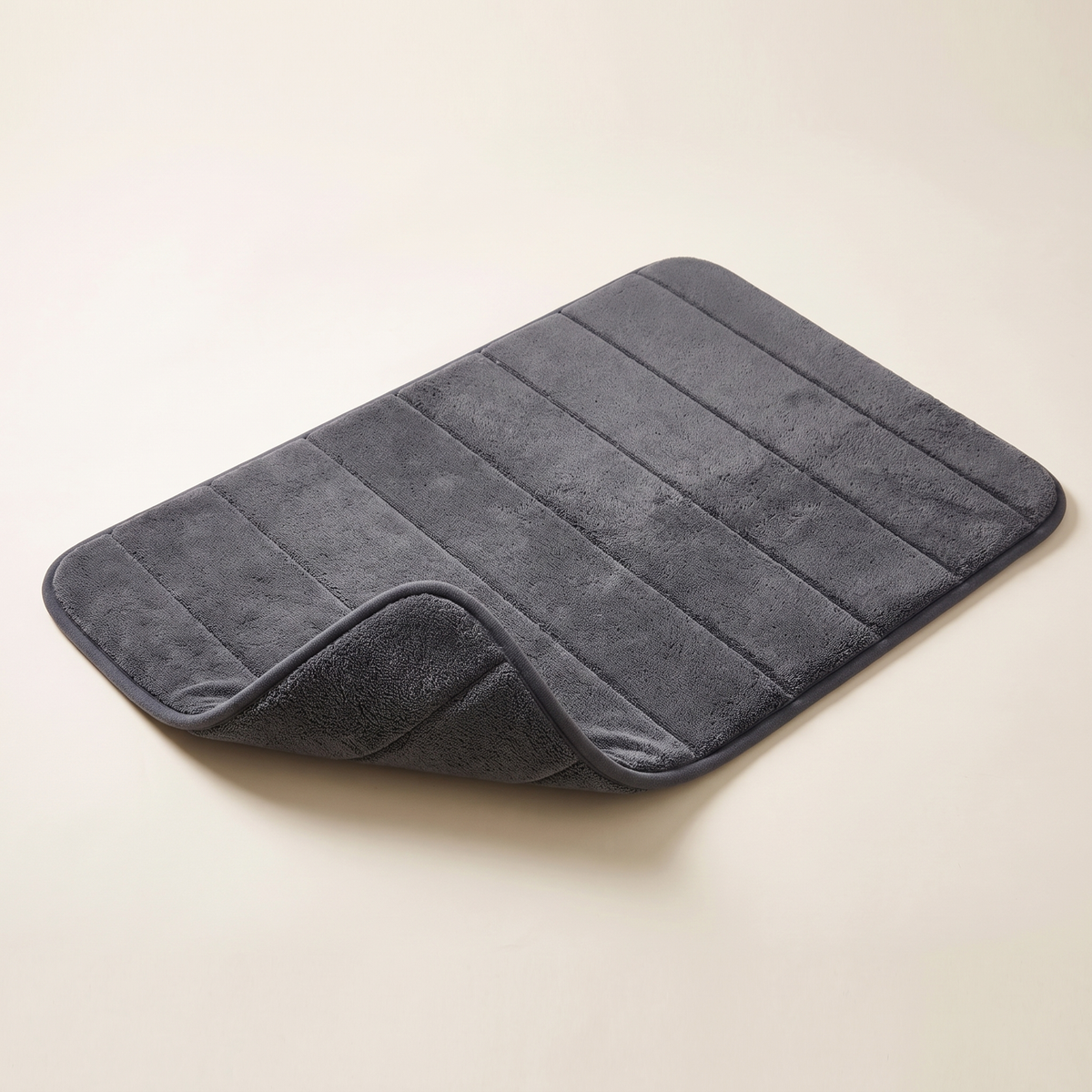 Soft striped bath mat, product photo