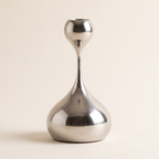 Silver metal candlestick holder, product photo