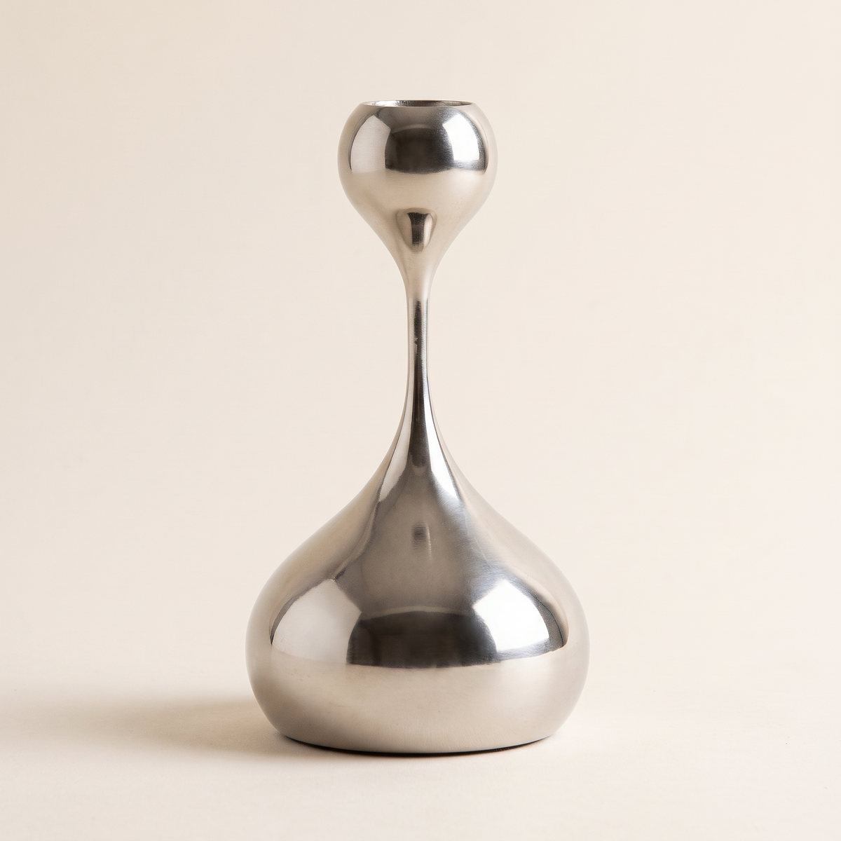 Silver metal candlestick holder, product photo